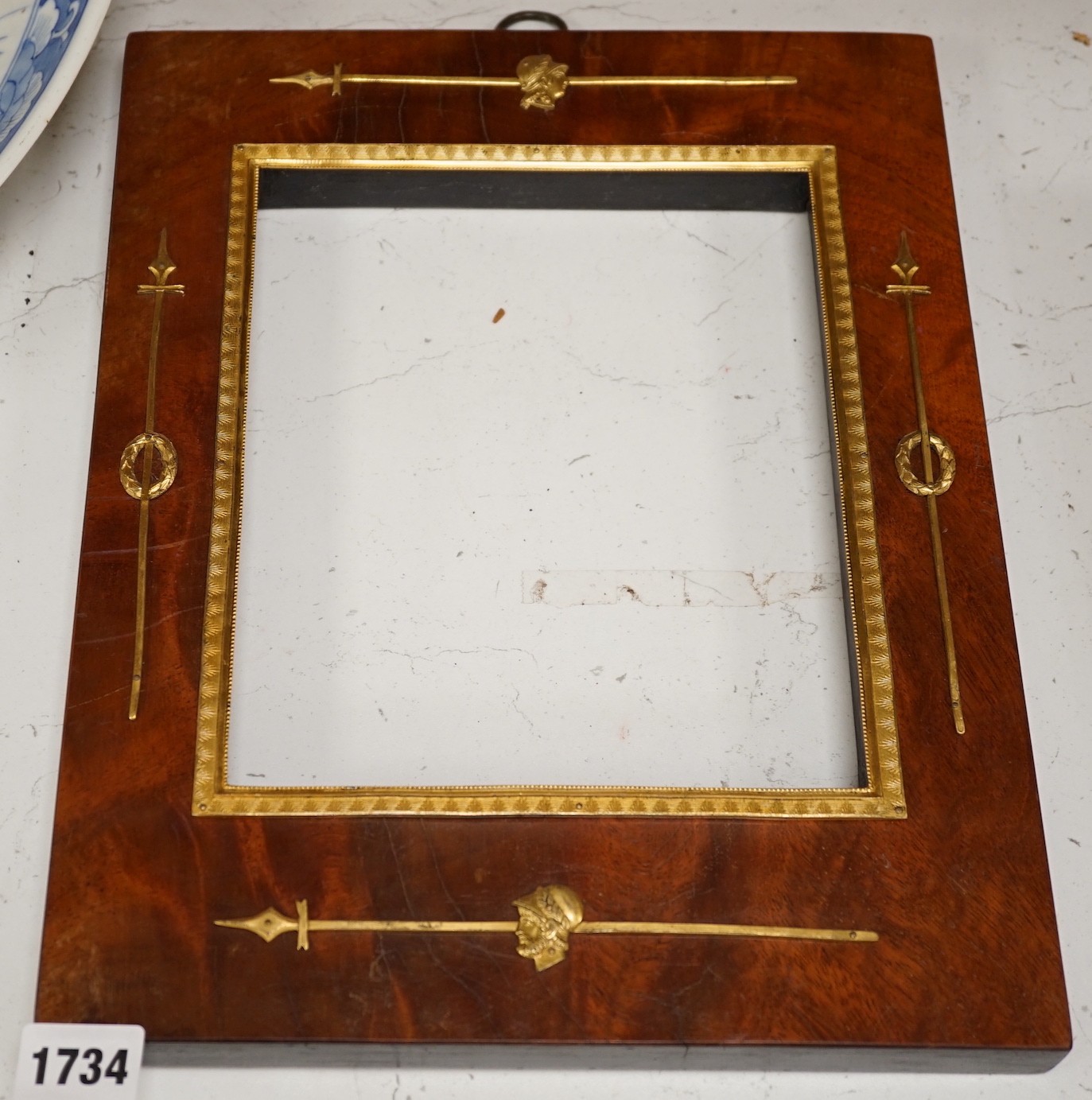 A French Empire ormolu mounted mahogany photograph frame, overall 34 x 26cm, aperture 21 x 17cm